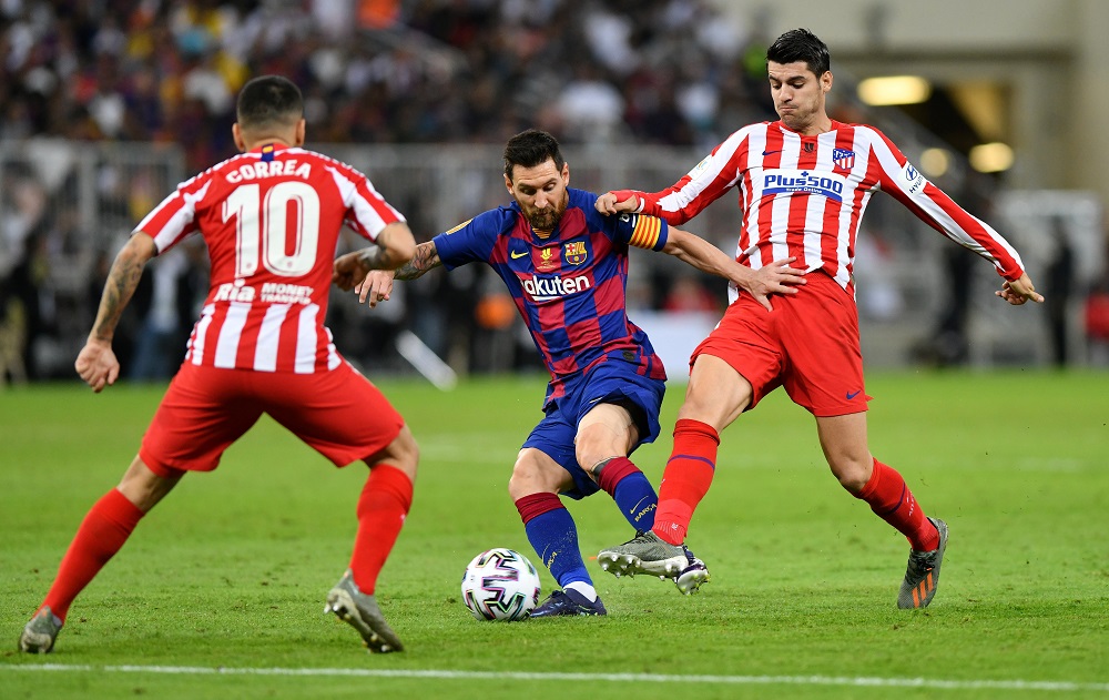 Barcelona's Lionel Messi in action with Atletico Madrid's Angel Correa and Alvaro Morata at King Abdullah Sports City in Jeddah January 9, 2020. u00e2u20acu201d Reuters pic