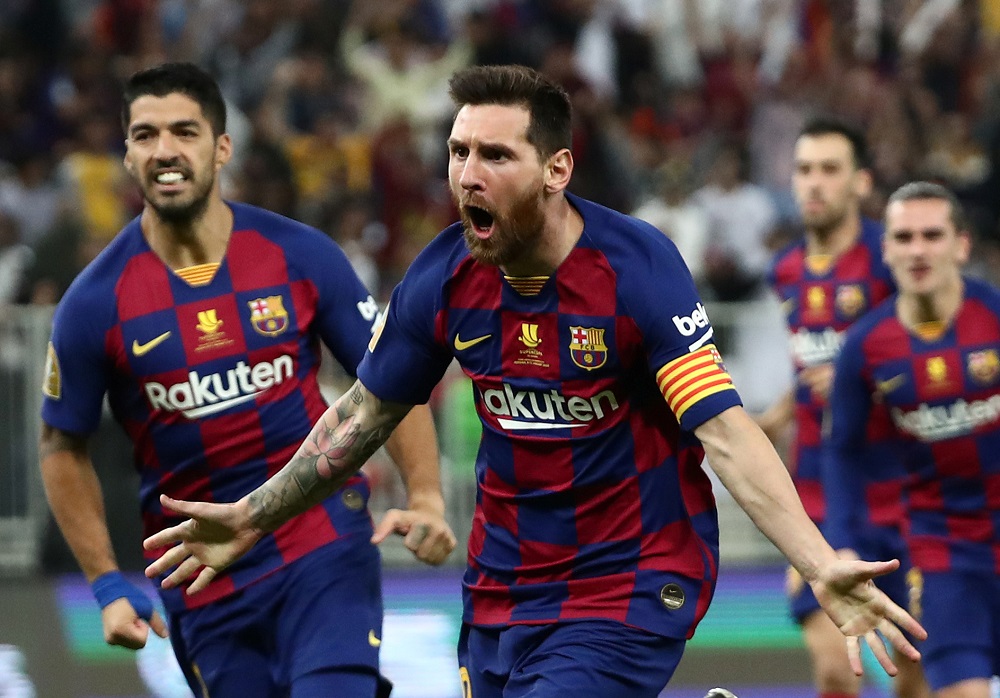 Barcelona's Lionel Messi celebrates scoring their first goal against Atletico Madrid with Luis Suarez at King Abdullah Sports City in Jeddah January 9, 2020. u00e2u20acu201d Reuters pic