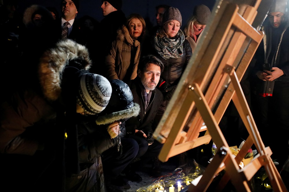 Canada's Prime Minister Justin Trudeau attends a candle light vigil for the victims of Ukraine International Airlines flight PS-752 on Parliament Hill in Ottawa January 9, 2020. u00e2u20acu201d Reuters pic
