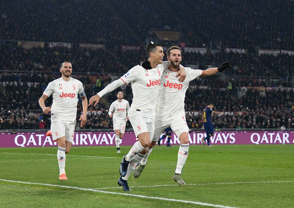 Juventus' Cristiano Ronaldo celebrates scoring their second goal with teammates against AS Roma at the Stadio Olimpico in Rome January 12, 2020. u00e2u20acu201d Reuters pic