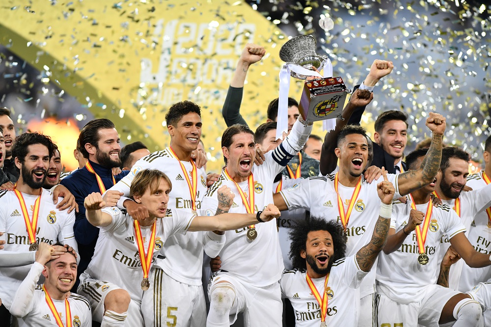 Real Madridu00e2u20acu2122s Sergio Ramos, Luka Modric and teammates pose with the trophy as they celebrate winning the Super Cup at the King Abdullah Sports City in Jeddah January 12, 2020. u00e2u20acu201d Reuters pic