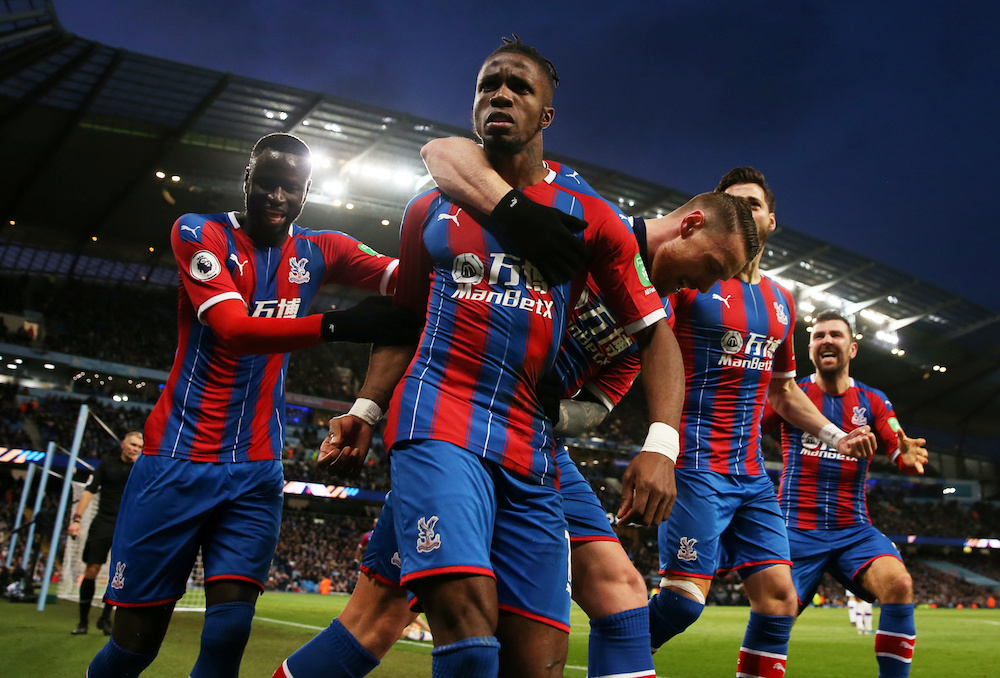 Crystal Palaceu00e2u20acu2122s Wilfried Zaha celebrates with teammates after Manchester Cityu00e2u20acu2122s Fernandinho scored an own goal during their Premier League match at Etihad Stadium in Manchester January 18, 2020. u00e2u20acu201d Action Images pic via Reuters