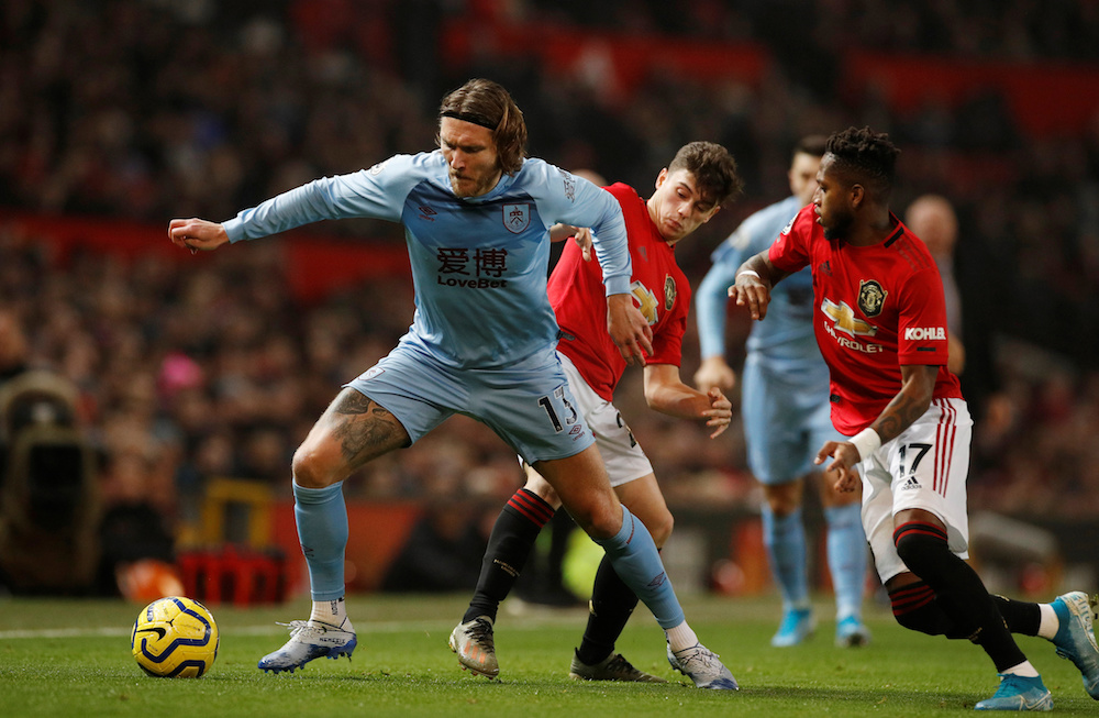 Burnleyu00e2u20acu2122s Jeff Hendrick in action with Manchester Unitedu00e2u20acu2122s Fred and Daniel James during their Premier League match at Old Trafford in Manchester January 22, 2020. u00e2u20acu201d Reuters pic