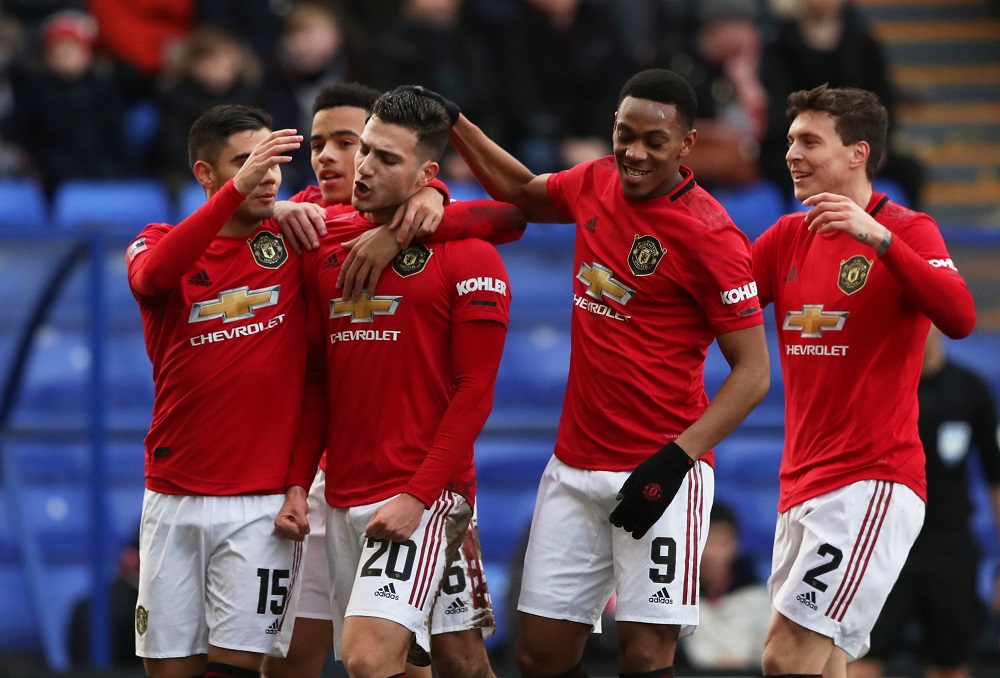 Manchester United's Diogo Dalot celebrates scoring their second goal with teammates during the FA Cup Fouth Round match against Tranmere Rovers at Prenton Park in Birkenhead January 26, 2020. u00e2u20acu201d Reuters pic