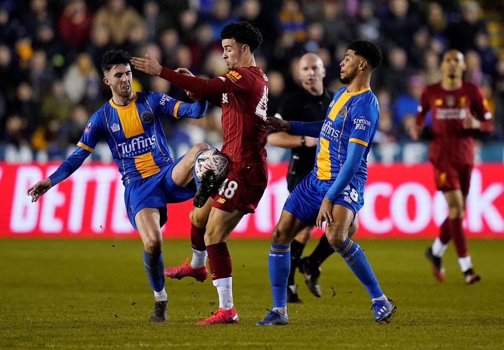 Liverpool's Curtis Jones in action with Shrewsbury Town's Joshua Laurent during the FA Cup match at Montgomery Waters Meadow in Shrewsbury January 26, 2020. u00e2u20acu201d Reuters pic