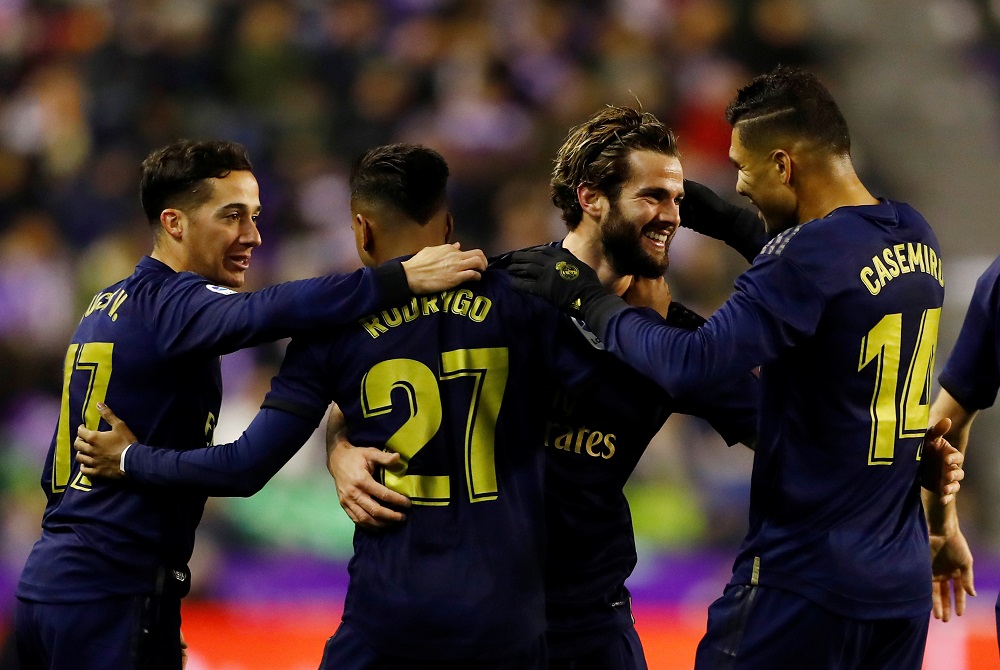 Real Madrid's Nacho celebrates scoring their first goal with teammates at the Estadio Jose Zorrilla in Spain January 26, 2020. u00e2u20acu201d Reuters pic