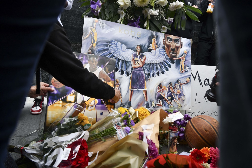 Fans mourn the loss of NBA legend Kobe Bryant outside of the Staples Centre in Los Angeles January 26, 2020. u00e2u20acu201d Picture by Harrison Hill-USA TODAY via Reuters
