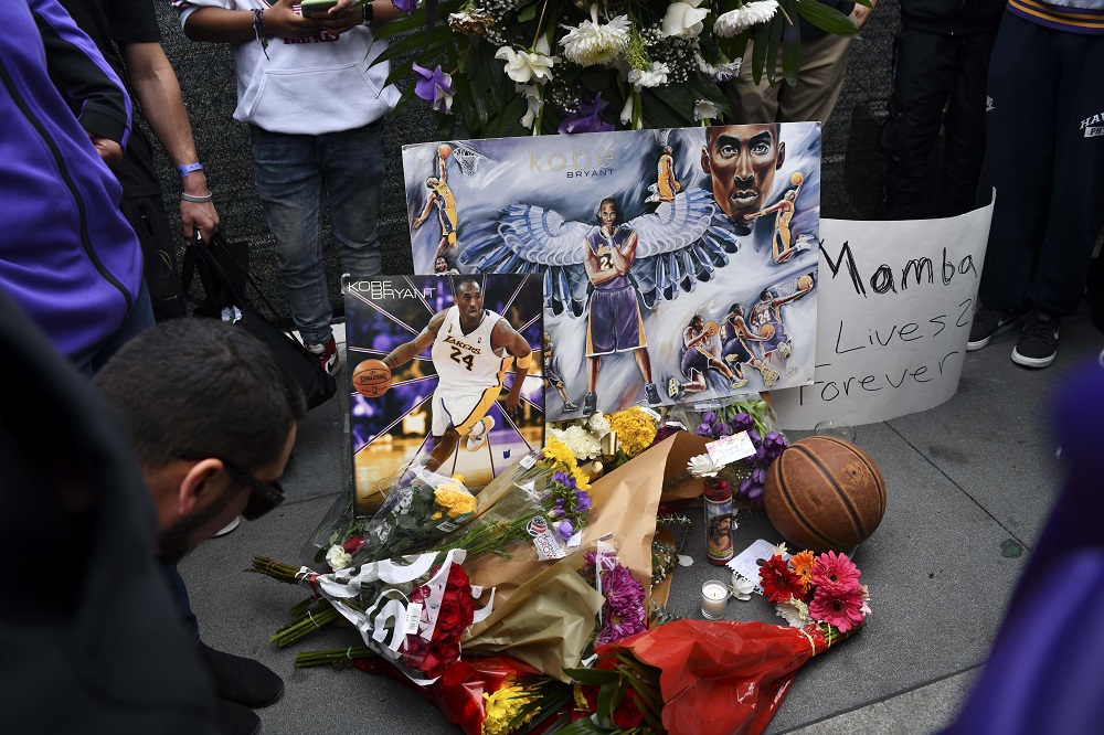 Fans mourn the loss of NBA legend Kobe Bryant outside of the Staples Centre in Los Angeles January 26, 2020. u00e2u20acu201d Picture by Harrison Hill-USA TODAY via Reuters