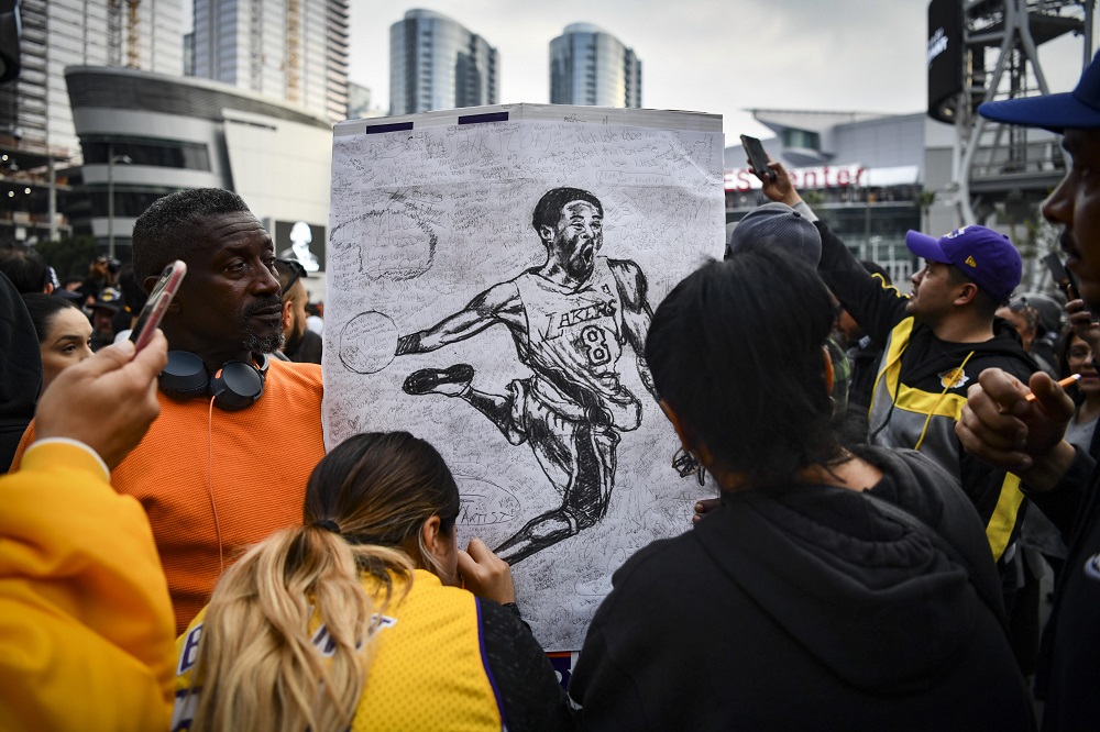 Fans mourn the loss of NBA legend Kobe Bryant outside of the Staples Centre in Los Angeles January 26, 2020. ¬— Picture by Harrison Hill-USA TODAY via Reuters