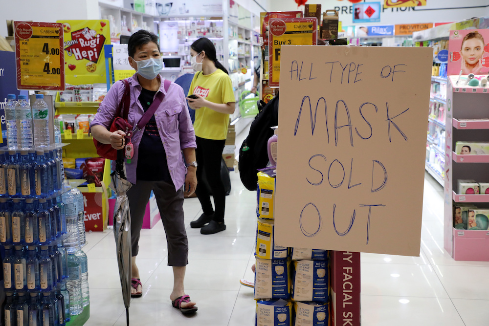 A sign announces that masks are sold out at a pharmacy in Kuala Lumpur January 29, 2020. u00e2u20acu201d Reuters pic