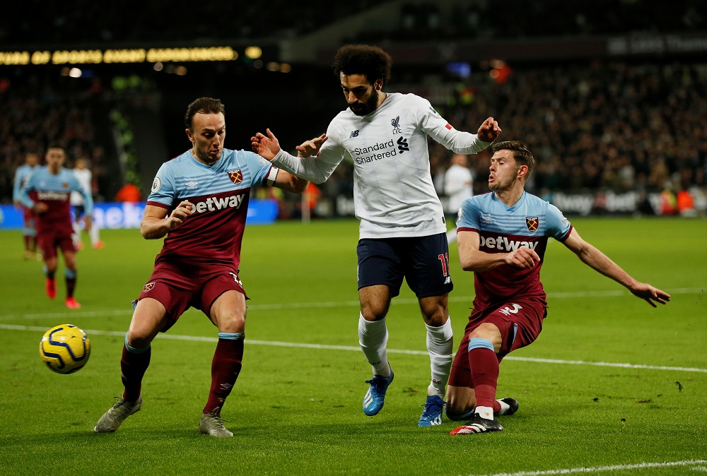 West Ham United's Aaron Cresswell and Mark Noble in action with Liverpool's Mohamed Salah at the London Stadium in London January 29, 2020. u00e2u20acu201d Reuters pic