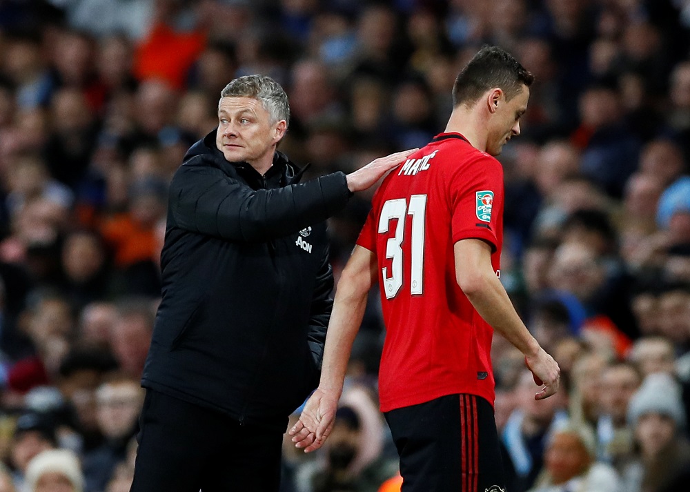 Manchester Unitedu00e2u20acu2122s Nemanja Matic with manager Ole Gunnar Solskjaer as he walks off after being shown a red card by referee Kevin Friend during the match against Manchester City in Manchester January 29, 2020. u00e2u20acu201d Action Images via Reuters