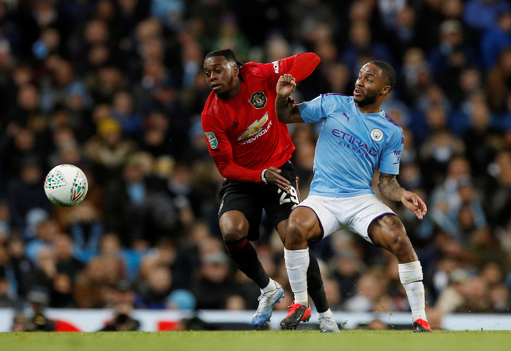 Manchester Unitedu00e2u20acu2122s Aaron Wan-Bissaka in action with Manchester Cityu00e2u20acu2122s Raheem Sterling during the Carabao Cup semi-final second leg match at Etihad Stadium in Manchester January 29, 2020. u00e2u20acu201d Reuters pic
