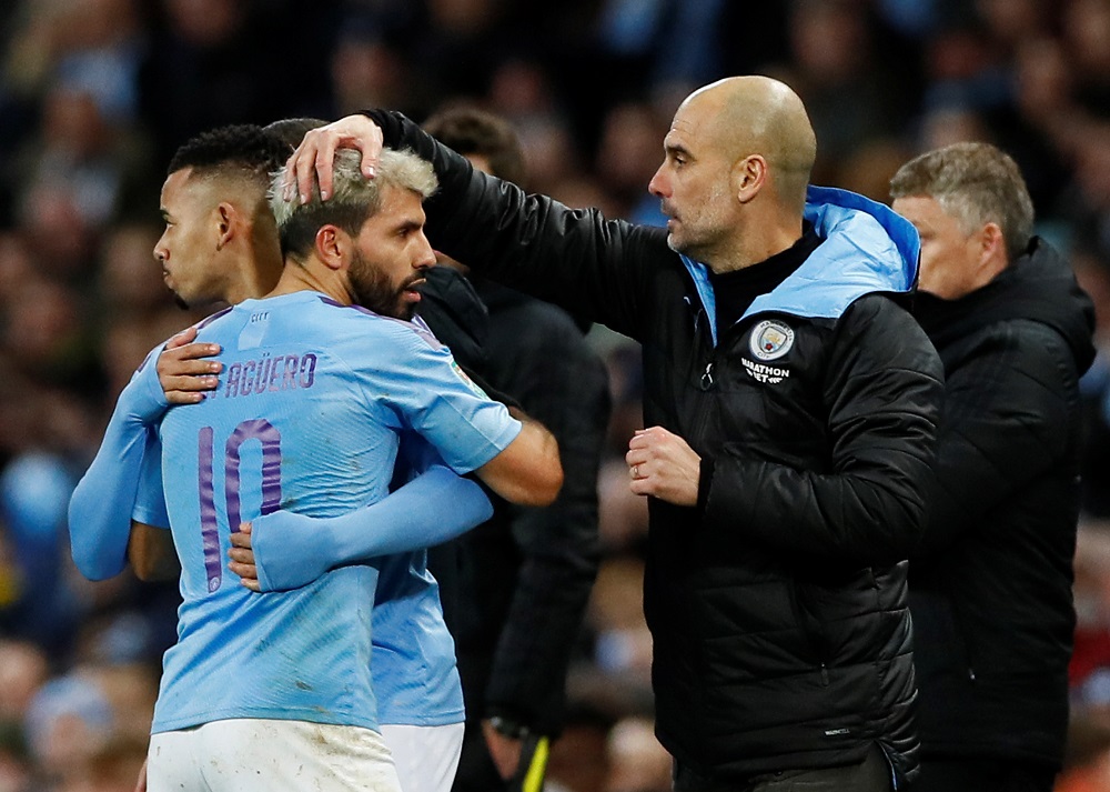Manchester City's Sergio Aguero with manager Pep Guardiola as he was substituted for Gabriel Jesus during the match against Manchester United at the Etihad Stadium in Manchester January 29, 2020. u00e2u20acu201d Action Images via Reuters 