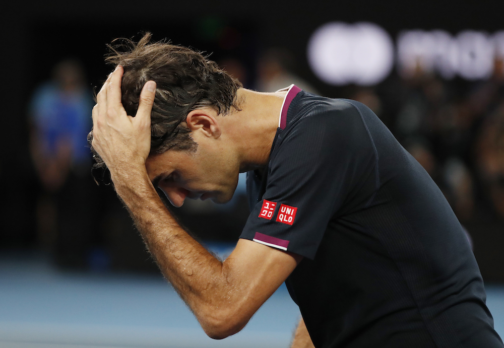 Switzerlandu00e2u20acu2122s Roger Federer reacts after his semi-final match against Serbiau00e2u20acu2122s Novak Djokovic at the Australian Open in Melbourne January 30, 2020. u00e2u20acu201d Reuters pic