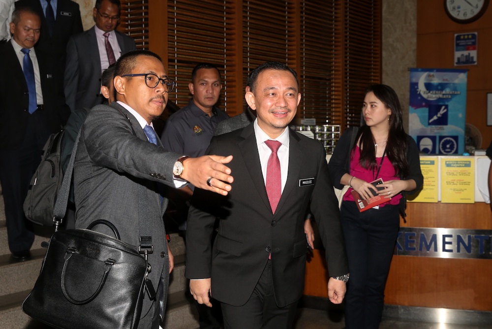 Maszlee Malik leaves after announcing his resignation as education minister at a press conference in Putrajaya January 2, 2020. u00e2u20acu201d Picture by Choo Choy May