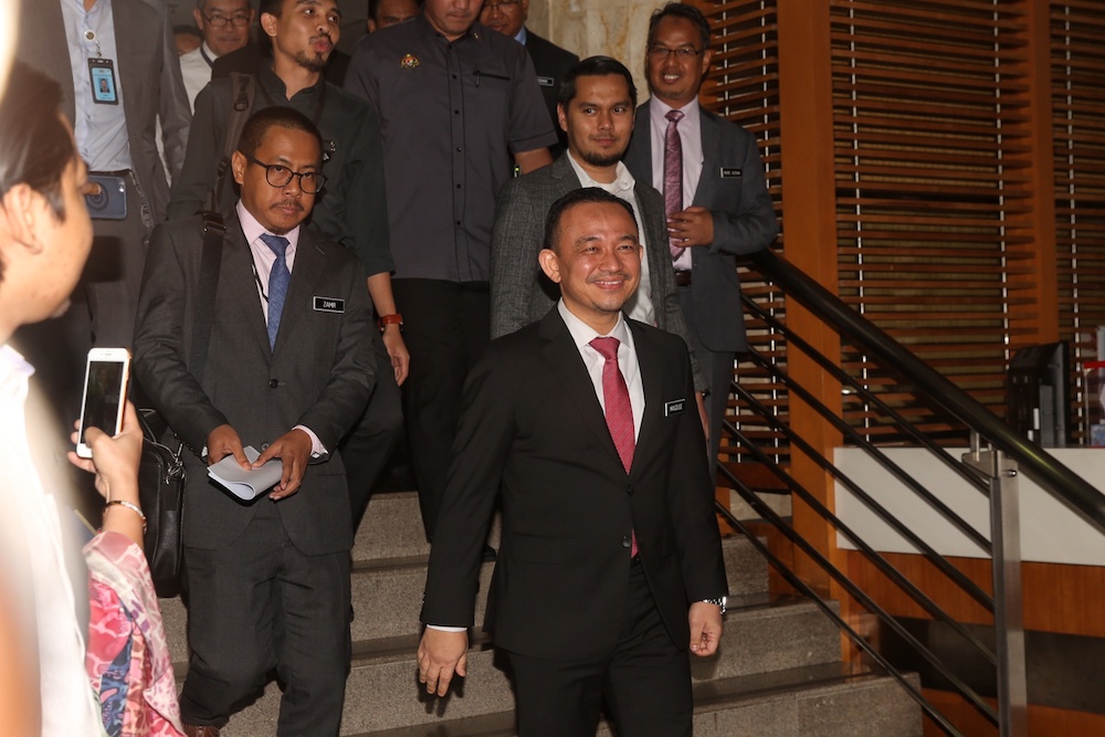 Maszlee Malik leaves after announcing his resignation as education minister at a press conference in Putrajaya January 2, 2020. u00e2u20acu201d Picture by Choo Choy May