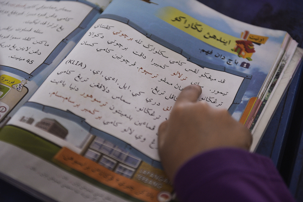 Students learn jawi on their first day of school at SK Seksyen 16 in Shah Alam January 2, 2020. u00e2u20acu201d Picture by Miera Zulyana