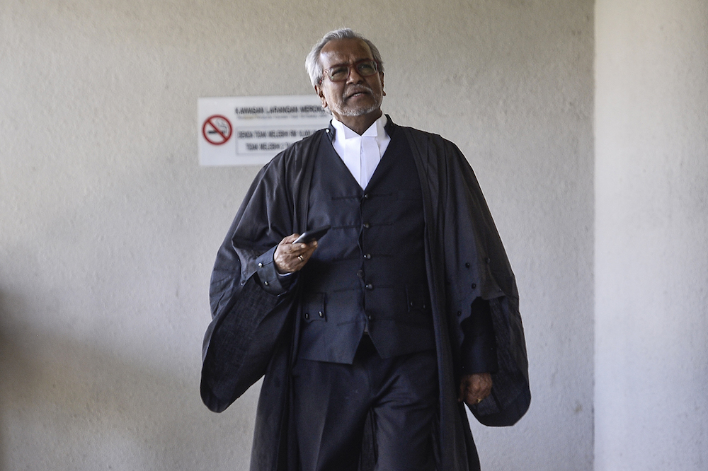 Defence lawyer Tan Sri Muhammad Shafee Abdullah arrives for Datuk Seri Najib Razak’s SRC trial at the Kuala Lumpur High Court January 6, 2020. — Picture by Miera Zulyana