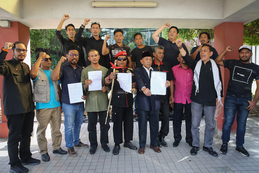 Chairman of Malaysia Muslim Watch Datuk Mahmud Abdullah poses for a group picture after handing over a memorandum to the US Embassy in Kuala Lumpur January 7, 2020. — Picture by Yusof Mat Isa