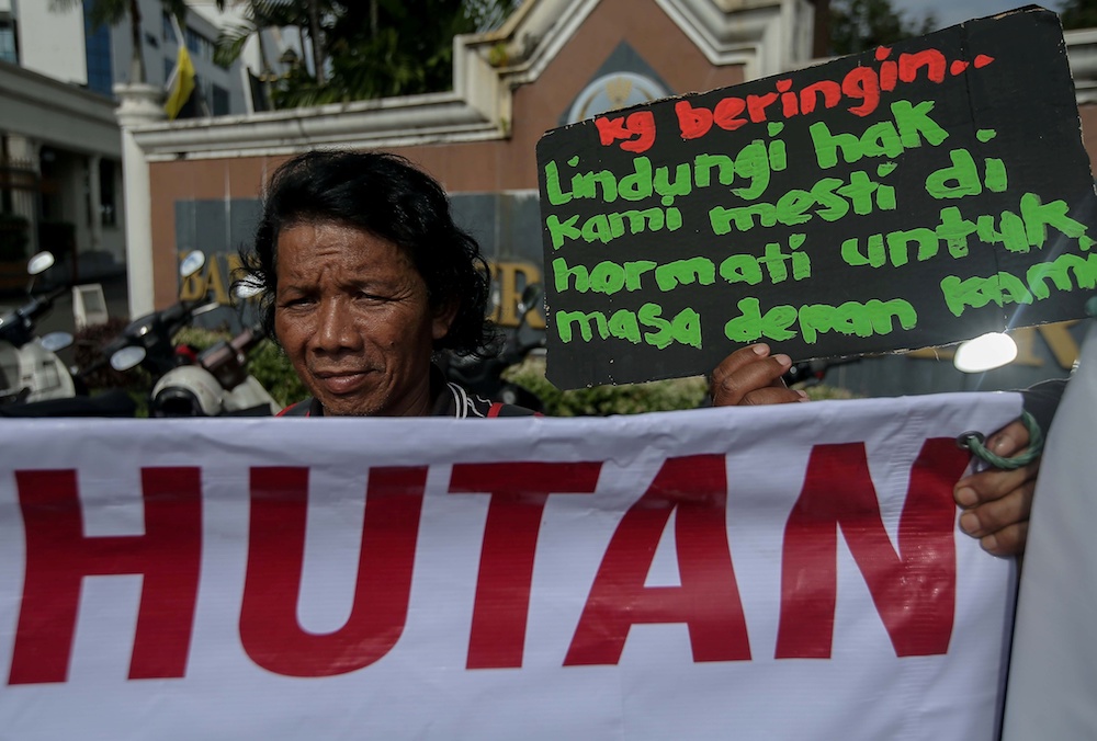 A group of Orang Asli together with environmental groups demonstrate at the State Secretariat Building in Ipoh January 8, 2020. u00e2u20acu201d Picture by Farhan Najib