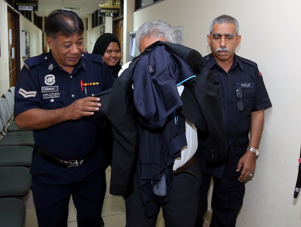 A former deputy director of Kuala Lumpur City Hall (DBKL) is seen at the Sessions Court in Ipoh January 9, 2020. u00e2u20acu201d Picture by Farhan Najib