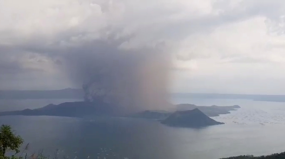 A view of the Taal volcano eruption seen from Tagaytay, Philippines January 12, 2020 in this still image taken from social media video. u00e2u20acu201d Social media pic via Reuters