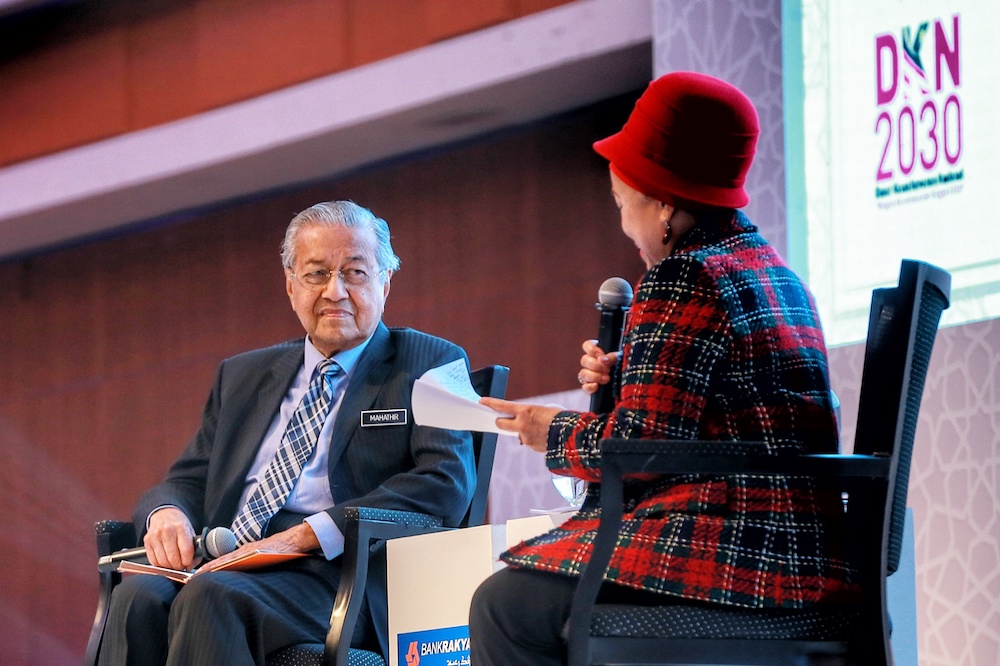 Prime Minister Tun Dr Mahathir Mohamad has a dialogue with Bank Rakyat chairman Datuk Noripah Kamso during the Bank Rakyat 2019 National Conference on Integrity in Kuala Lumpur January 14, 2020. u00e2u20acu201d Picture by Ahmad Zamzahuri