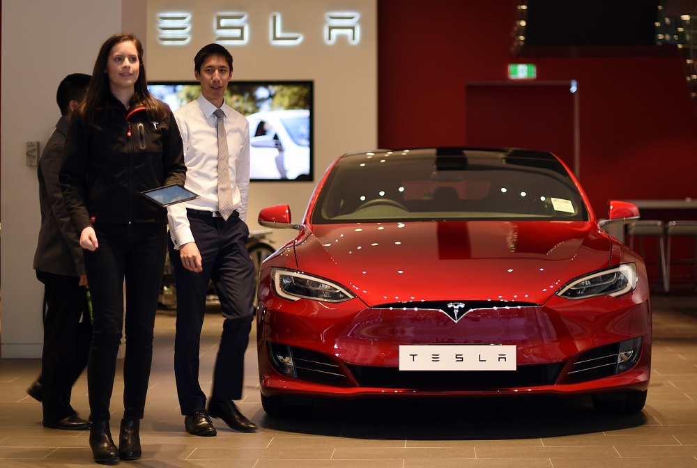 Teslas may soon be able to talk to people outside the car. u00e2u20acu201d AFP pic