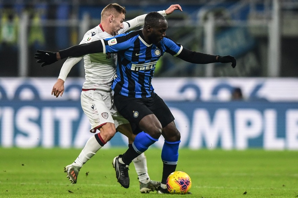 Inter Milan's Belgian forward Romelu Lukaku (right) holds off Cagliari's Croatian midfielder Marko Rog during the round of 16 football match against Cagliari at the San Siro stadium in Milan January 14, 2020. u00e2u20acu201d AFP pic