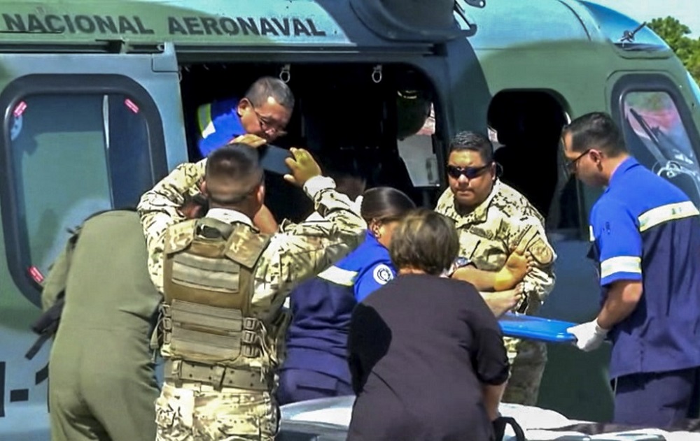 Grab taken from Panamanian channel TVN Noticias showing Panamanian paramedics carrying one of the 15 people rescued from a religious sect on a stretcher in Santiago, Veraguas province, Panama January 15, 2020. u00e2u20acu201d AFP pic