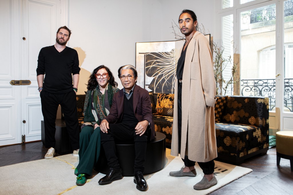 Kenzo Takada, flanked by his assistants Jonathan Bouchet Manheim (L), Wanda Jelmini (2L) and Engelbert Honorat (R), poses in his studio in Paris on January 14, 2020 ahead of the launching of K3, his design brand. u00e2u20acu201d AFP picnn