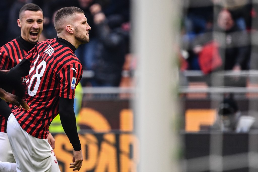 AC Milan's Croatian forward Ante Rebic (Front left) celebrates after scoring a last second winnin goal during the Italian Serie A football match AC Milan vs Udinese on January 19, 2020 at the San Siro stadium in Milan. u00e2u20acu201d AFP picnn