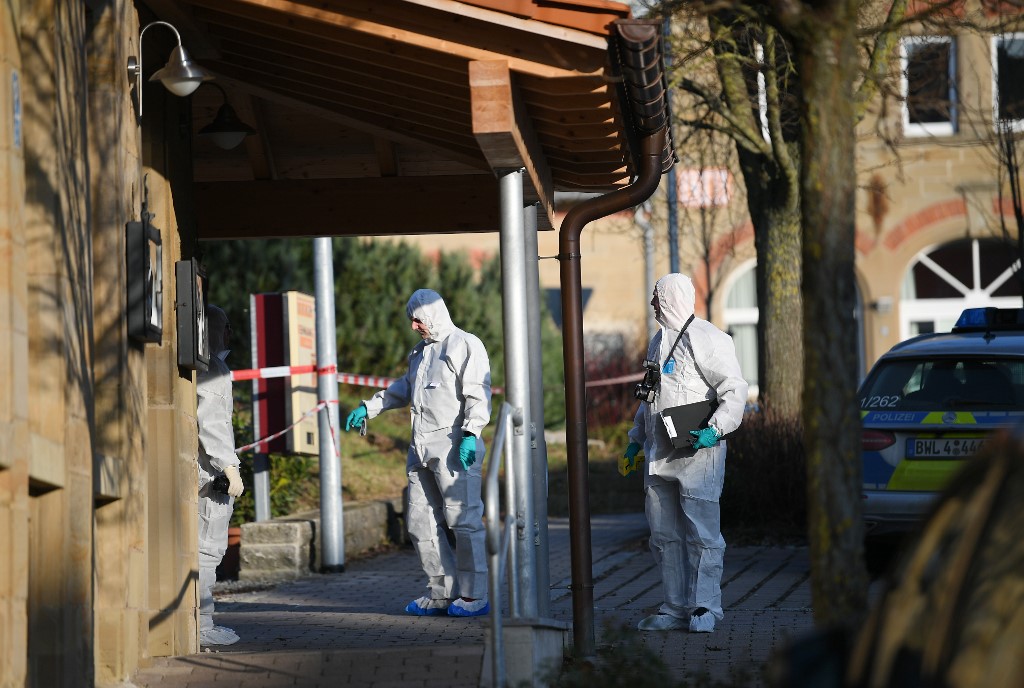 German forensic policemen work at a house after a shooter, believed to have a personal motive, launched an assault on January 24, 2020 in the town of Rot am See in southwestern Germany. u00e2u20acu201d AFP pic