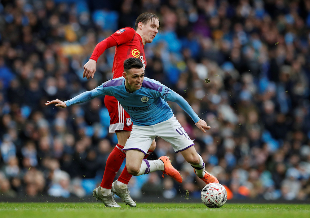Manchester City's Phil Foden in action with Fulham's Stefan Johansen Etihad Stadium, Manchester January 26, 2020. u00e2u20acu201d Reuters pic