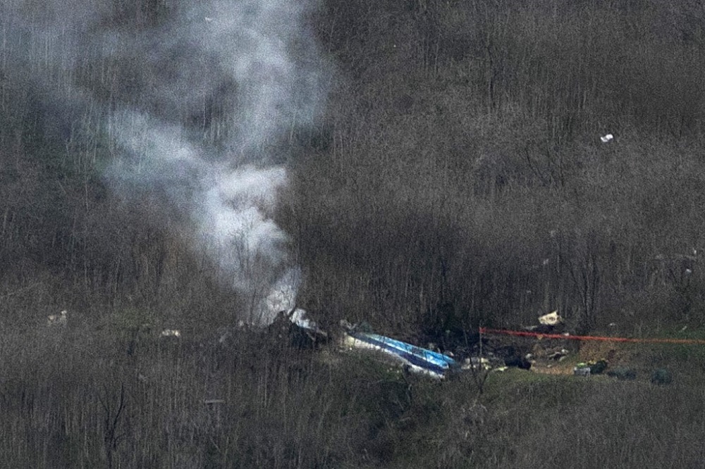 Wreckage of the crashed helicopter that was carrying former NBA star Kobe Bryant and his 13-year-old daughter Gianna smoulders on the ground in Calabasas, California January 27. u00e2u20acu201d AFP pic