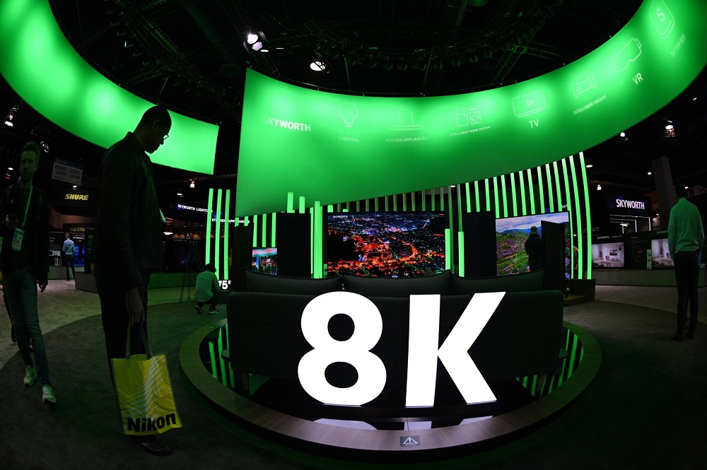 Attendees look at 8K television displays by Skyworth at the 2020 Consumer Electronics Show. u00e2u20acu201d AFP picnn