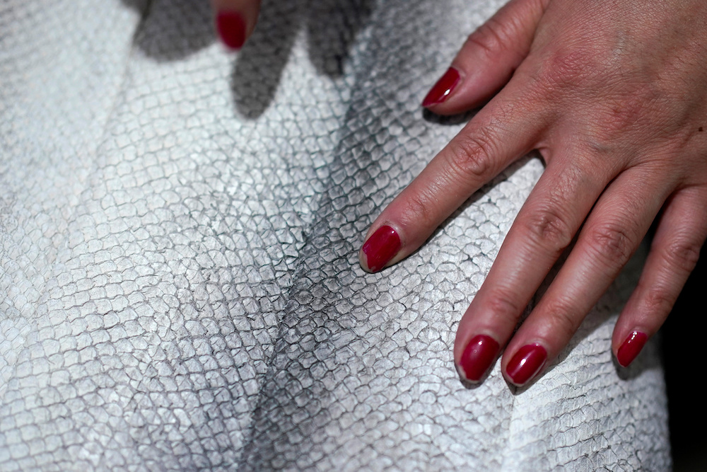 Ethnic Hezhen You Wenfeng's Chinese Han student learns how to make clothes from fish skin at You's studio in Tongjiang December 31, 2019. u00e2u20acu201d Reuters pic