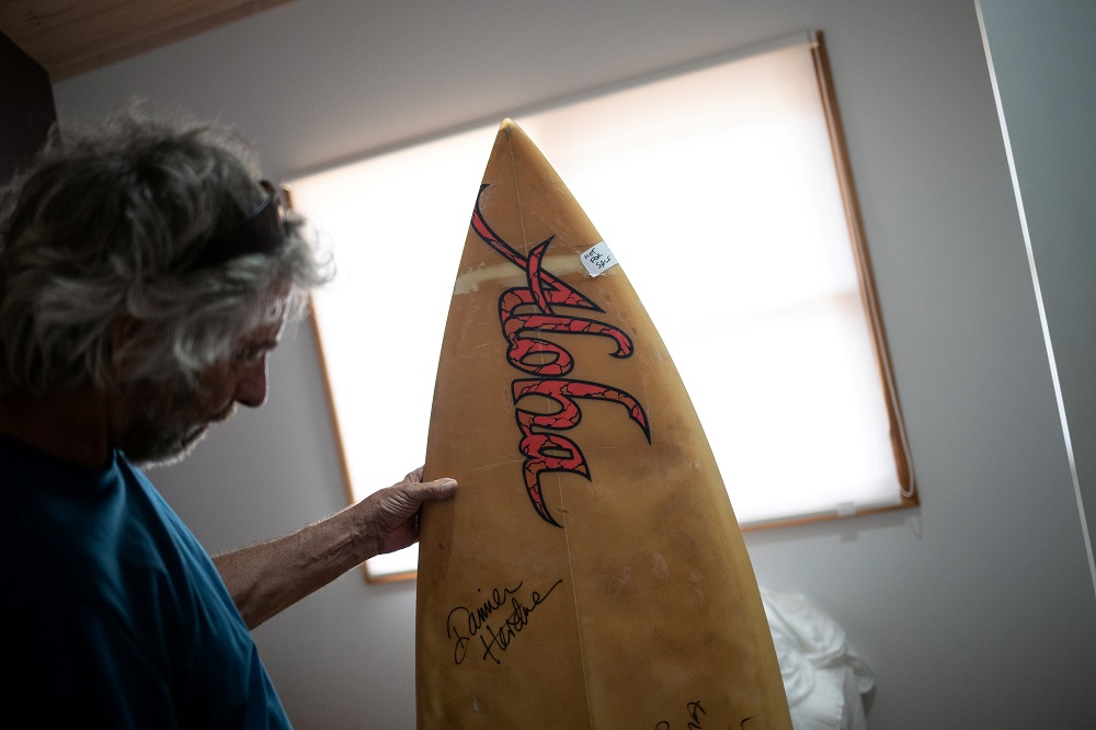 Australian surfer David Ford, 62, shows one of the few remaining surfboards of his vintage surfboard collection that was destroyed in the recent bushfires in Lake Conjola, Australia January 15, 2020. ― Reuters pic