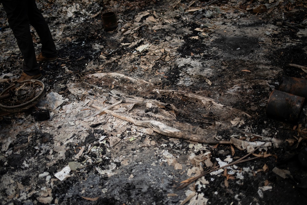Australian surfer David Ford, 62, stands next to the remains of a surfboard, part of his vintage surfboard collection that was destroyed in the recent bushfires in Lake Conjola, Australia January 15, 2020. u00e2u20acu2022 Reuters pic