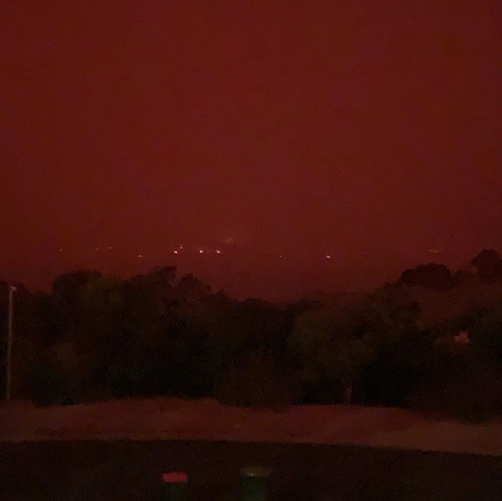 The sky is tinted red as surrounding bushfires close in on the town of Mallacoota, Victoria, Australia, January 4, 2020, in this photo obtained from social media. u00e2u20acu201d Reuters picnn