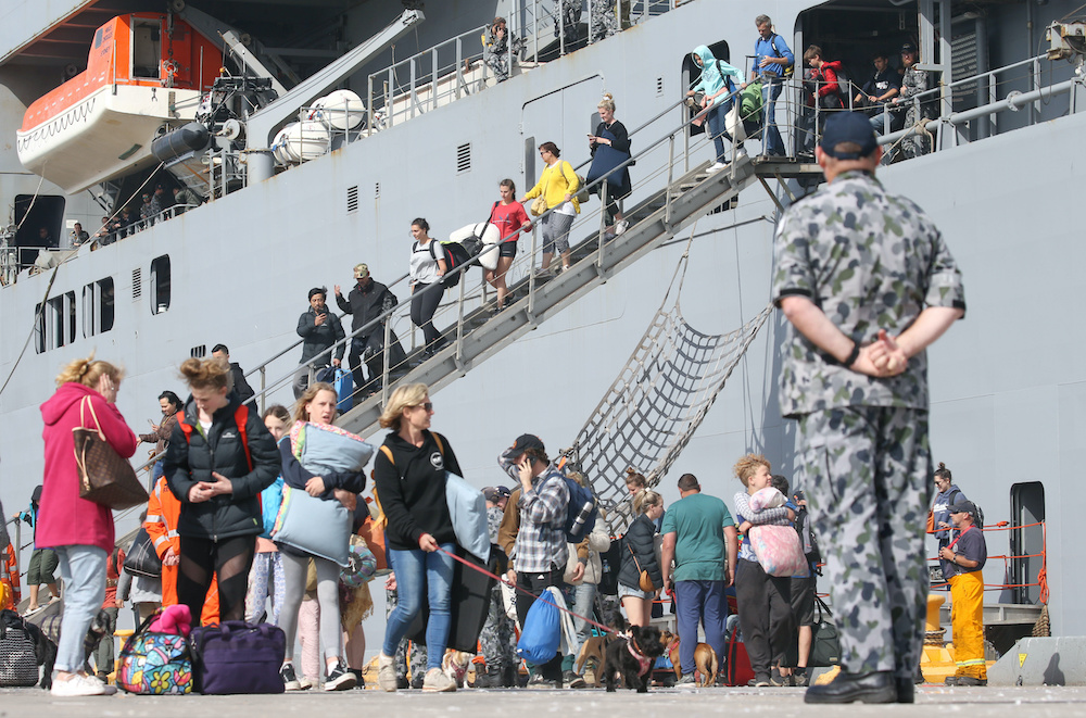 Evacuees from Mallacoota arrive on the navy ship HMAS Choules at the port of Hastings, Victoria, Australia, January 4, 2020. u00e2u20acu201d Reuters picnn