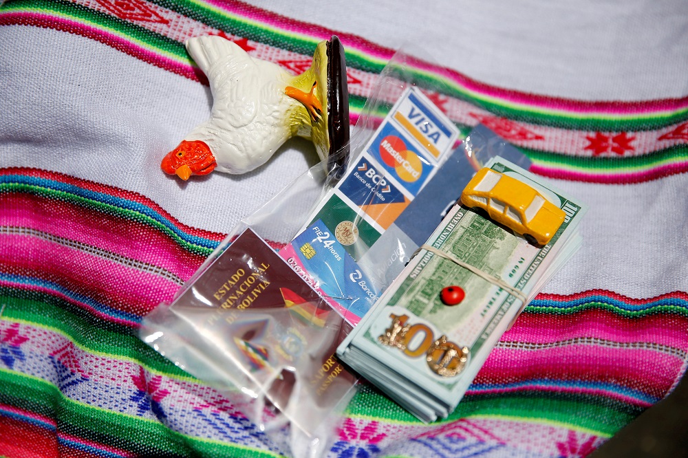 Bills and other goods are seen during the u00e2u20acu02dcAlasitasu00e2u20acu2122 fair where Bolivians buy miniatures versions of goods they would like to own with the hope of acquiring them in real life in La Paz, Bolivia, January 24, 2020. u00e2u20acu201d Reuters pic