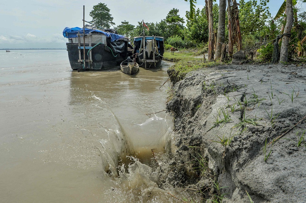 This picture taken on September 17, 2019 shows soil erosion caused by the waters of Brahmaputra river at Majuli island in the northeastern Indian state of Assam. — AFP pic