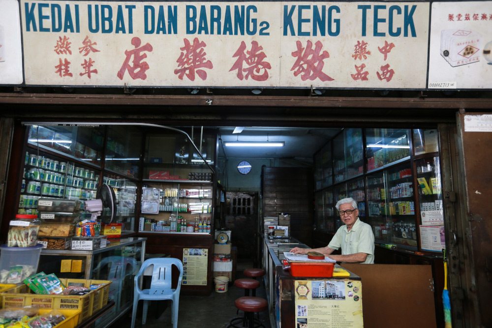 Many of the market’s shops are manned by seniors, including this store selling traditional Chinese remedies. — Picture by Ahmad Zamzahuri