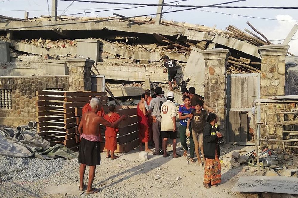 This handout photo released by Fresh News on January 3, 2020, shows people gathering after a seven-storey building under construction collapsed, in the southern Cambodiau00e2u20acu2122s coastal, Kep province. u00e2u20acu201d AFP pic