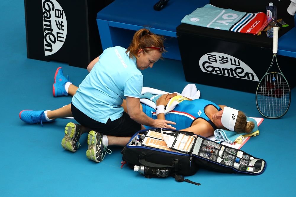 Ukraine's Dayana Yastremska receives medical treatment during the match against Denmark's Caroline Wozniacki. u00e2u20acu201d Reuters picnn