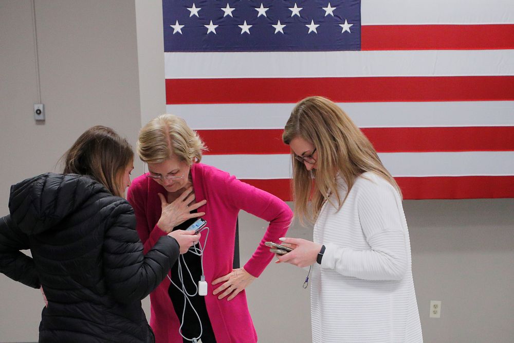 Democratic US presidential candidate and US Senator Elizabeth Warren (D-MA) is told by an aide that she received the endorsement of the Des Moines Register newspaper after a campaign town hall meeting in Muscatine, Iowa, January 25, 2020. u00e2u20acu201d Reuters pic