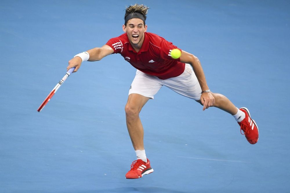 Dominic Thiem of Austria hits a return in his menu00e2u20acu2122s singles match against Hubert Hurkacz of Poland at the ATP Cup tennis tournament in Sydney on January 8, 2020. u00e2u20acu201d AFP pic