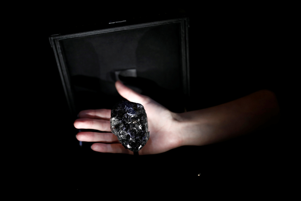 A Louis Vuitton employee displays a recently purchased u00e2u20acu02dcSewelo diamondu00e2u20acu2122, the worldu00e2u20acu2122s second-largest diamond, a 1,758 carat jewel of about the size of a tennis ball during a press preview in Paris, France, January 21, 2020. u00e2u20acu201d Reuters pic 